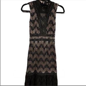 Charlotte Russe lace open back ruffle skirt mini black dress. Size XS.